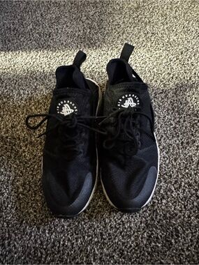 Nike Black womans Athletic Sneakers with White Accents